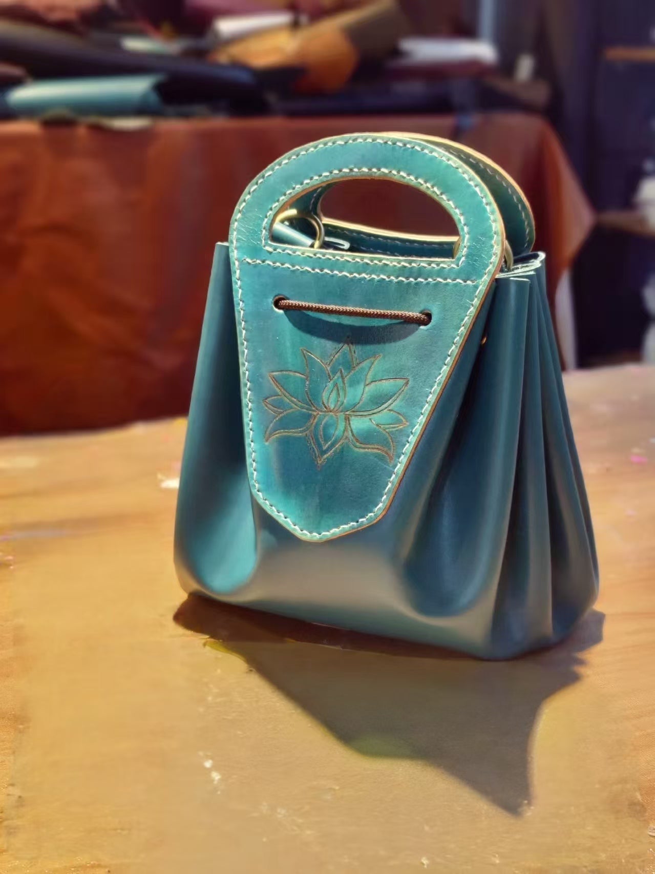 Handmade leather lotus pattern drawstring tote shoulder bag