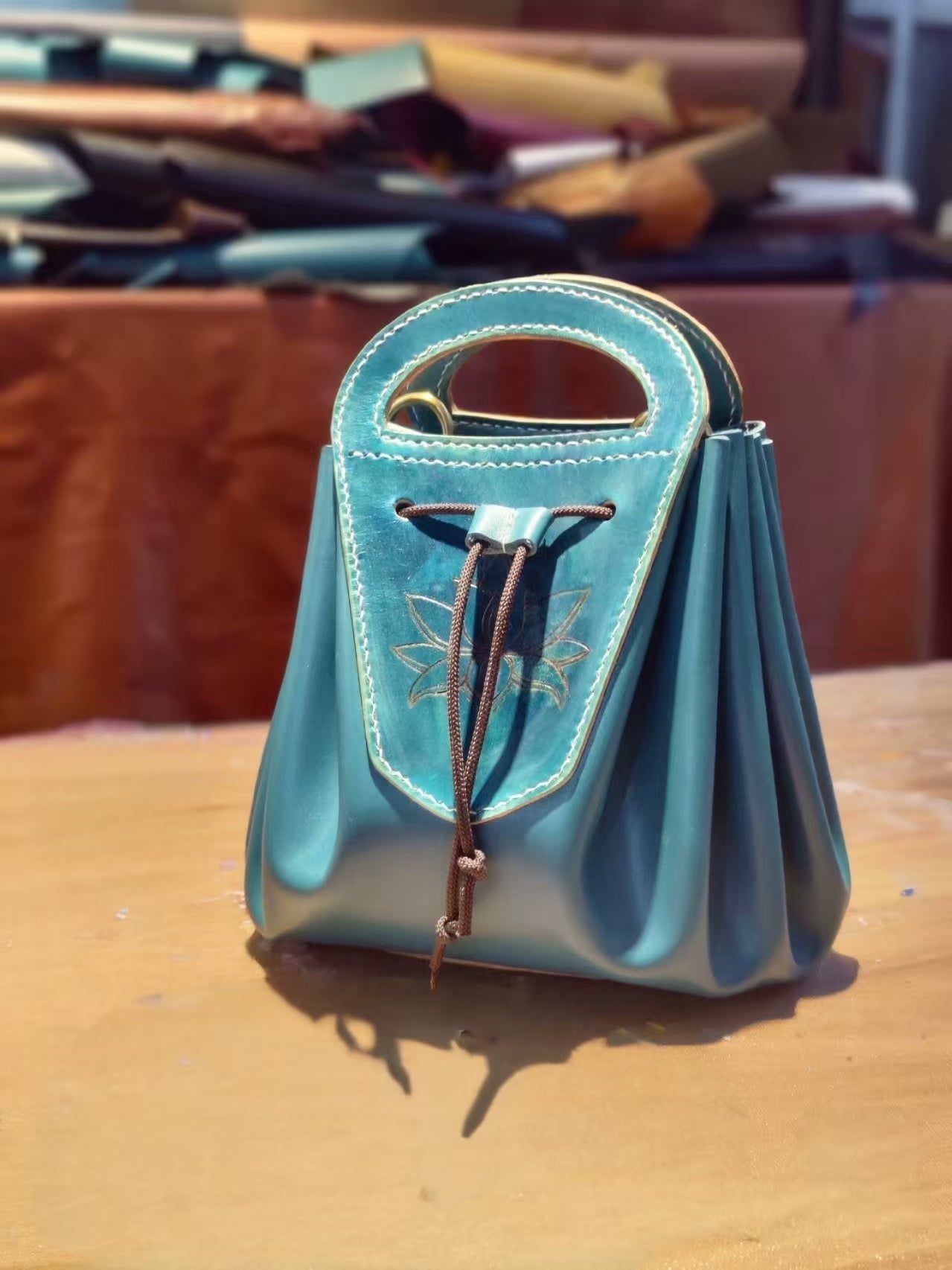 Handmade leather lotus pattern drawstring tote shoulder bag